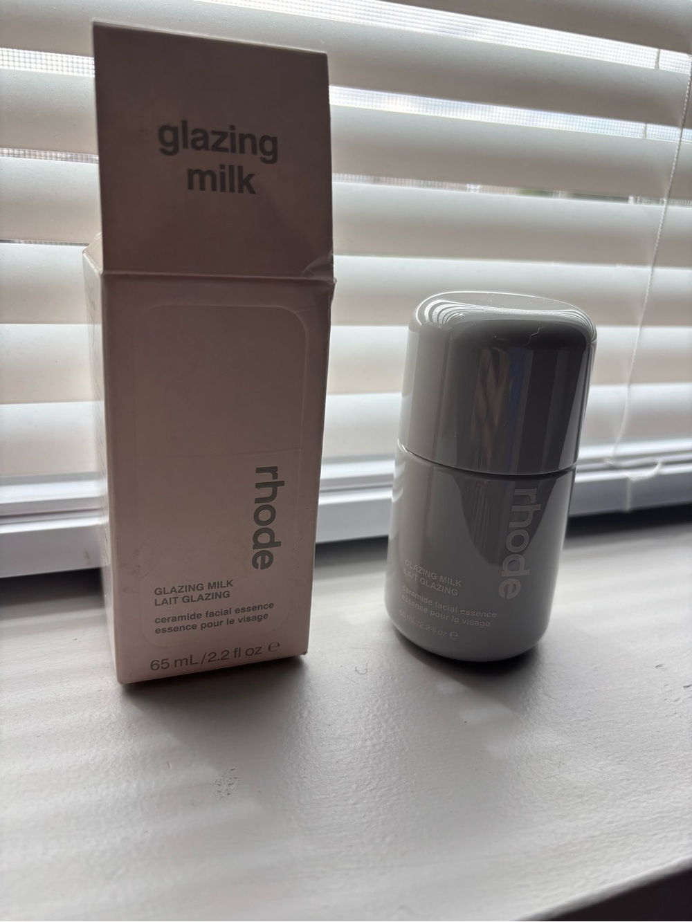 RHODE Glazing Milk Facial Essence — Gray Packaging